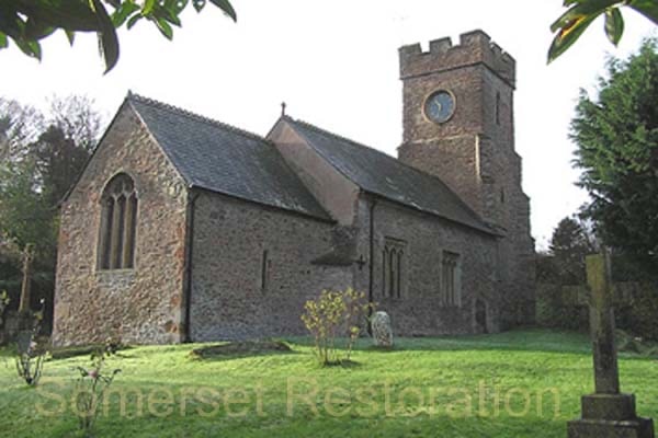 Historic stone church with clock tower — ecclesiastical restoration