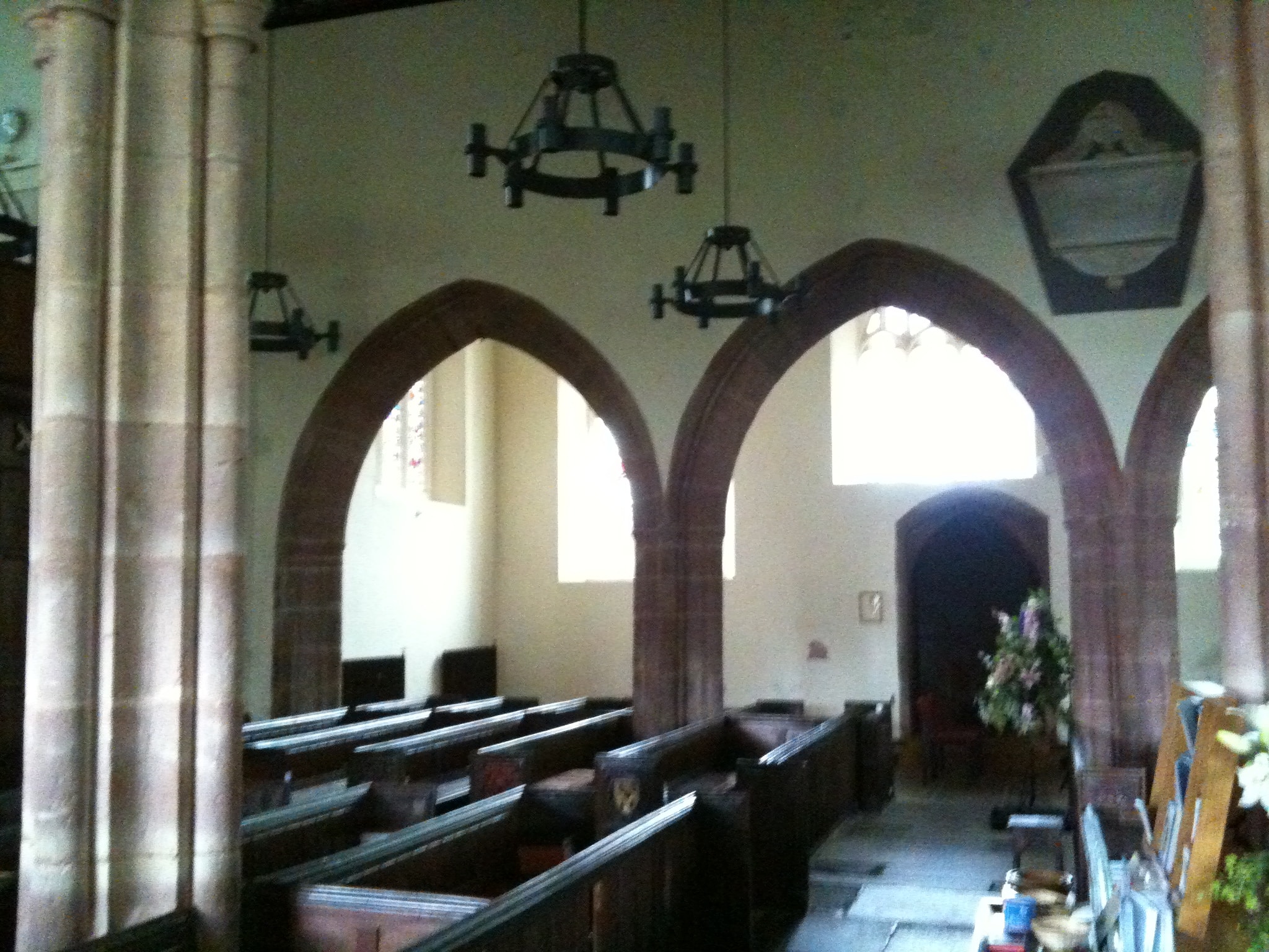 Historic church interior with arched doorways