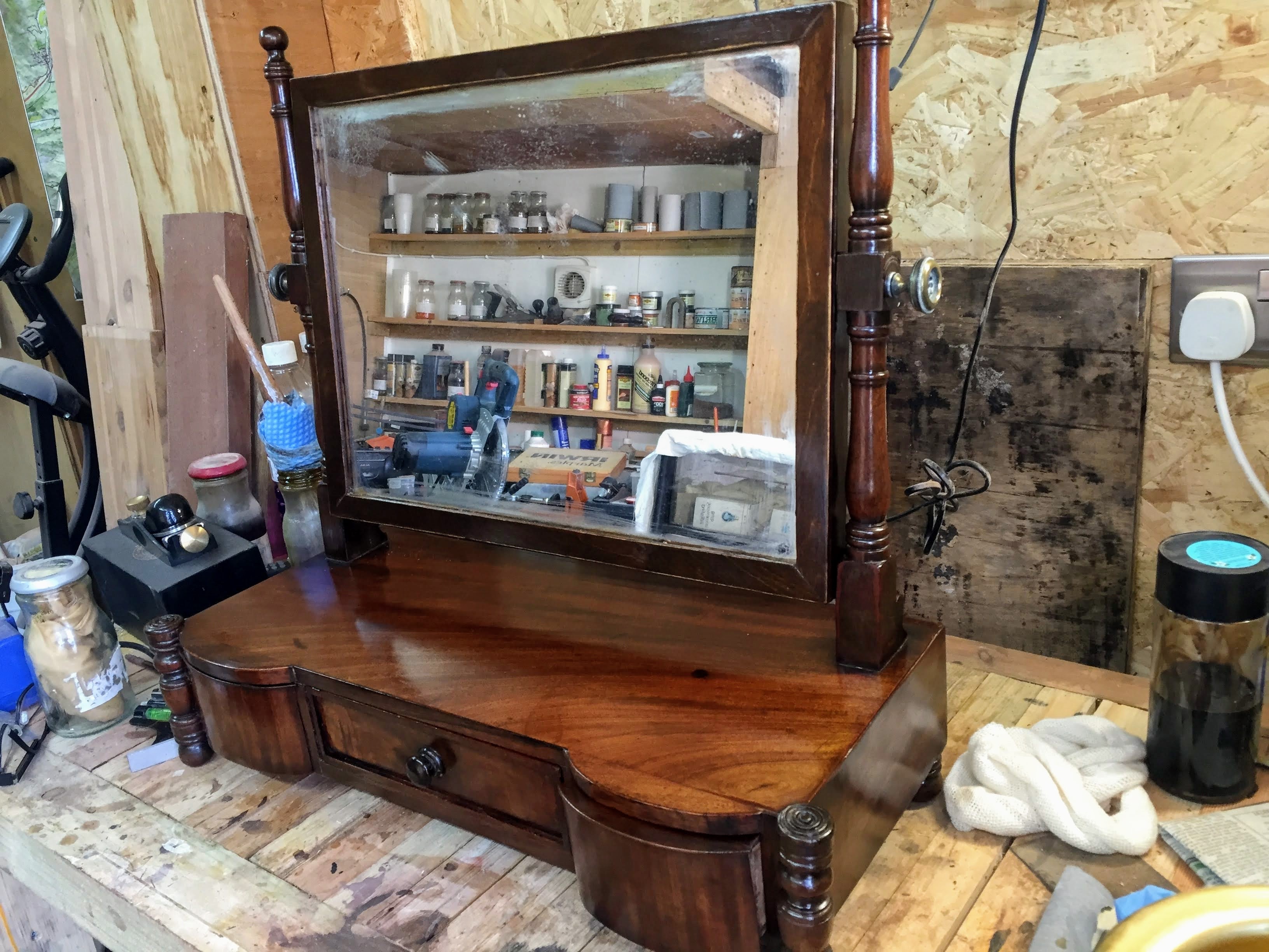 Antique wooden furniture restoration in workshop