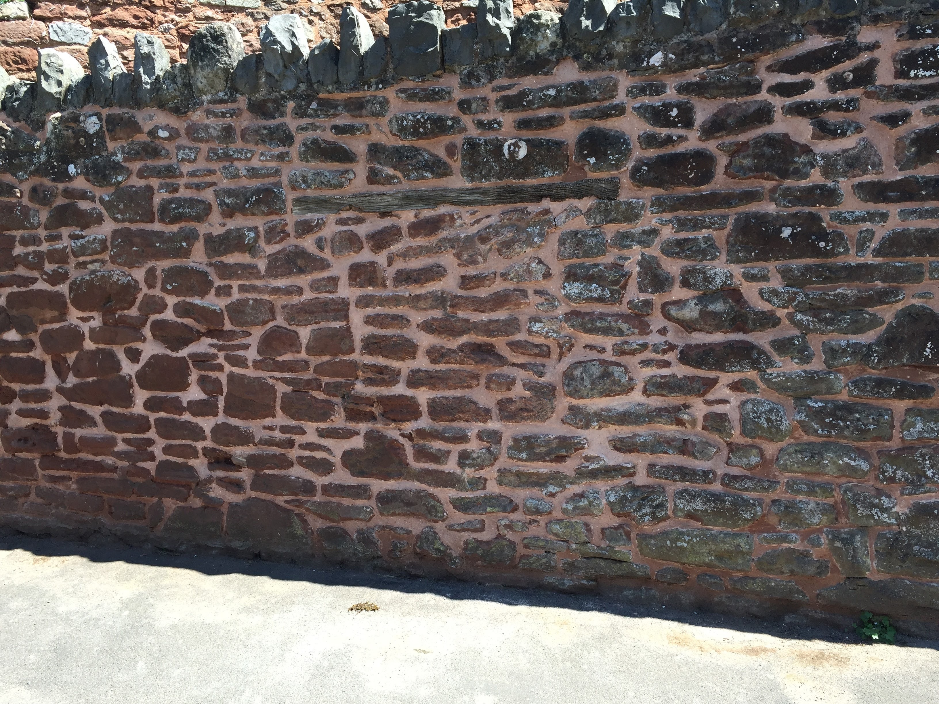 Lime mortar repointing of historic stone wall